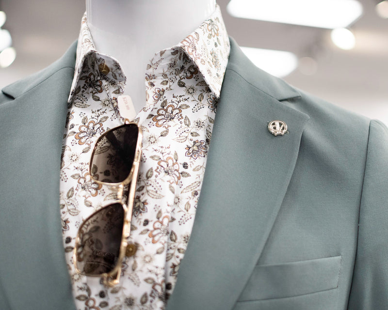 Dolce Vesta Light Blue Suit closeup on mannequin in store. 