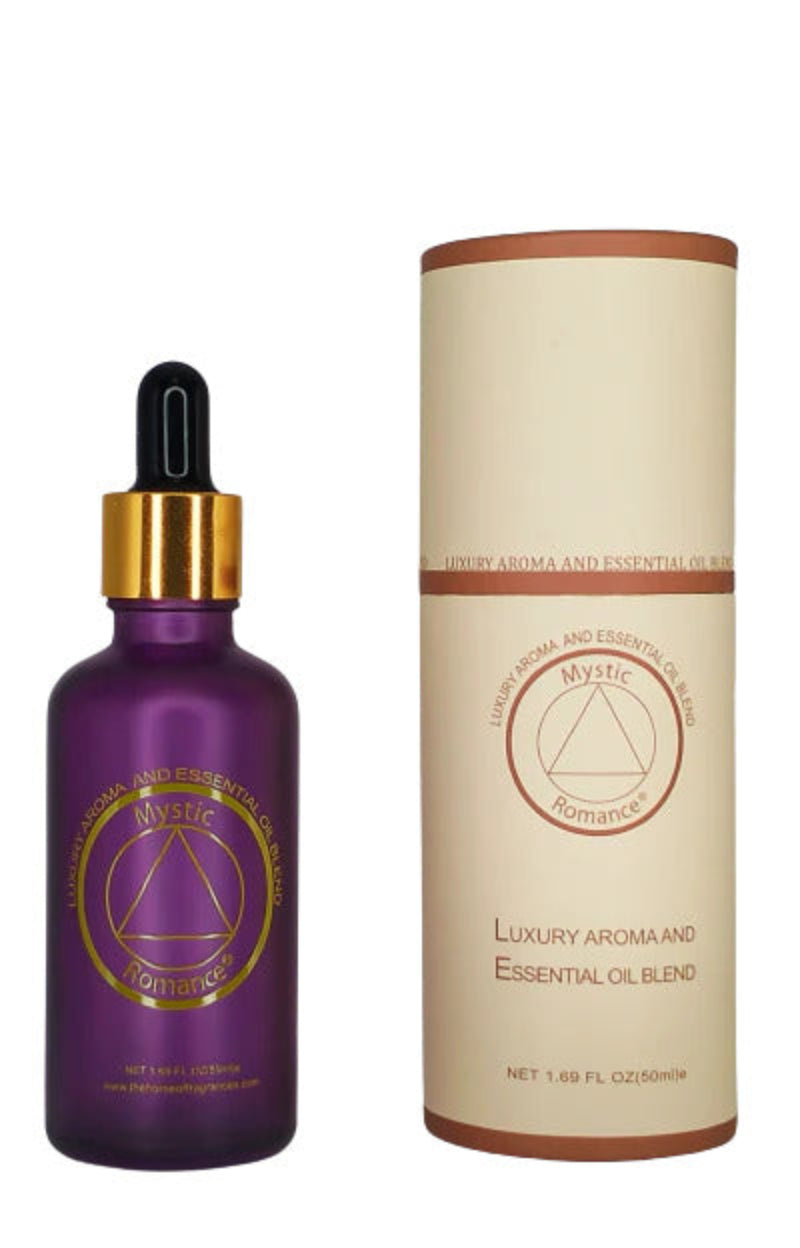 Purple essential oil dropper bottle with gold accents and beige cylindrical packaging on a white background