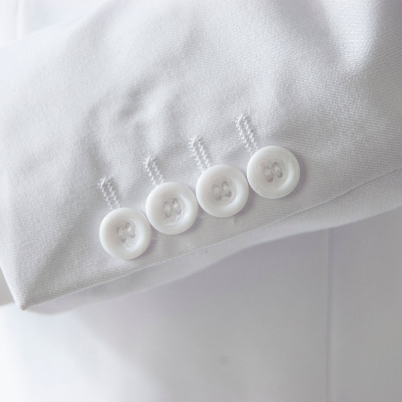 white 2-piece slim-fit suit cuff